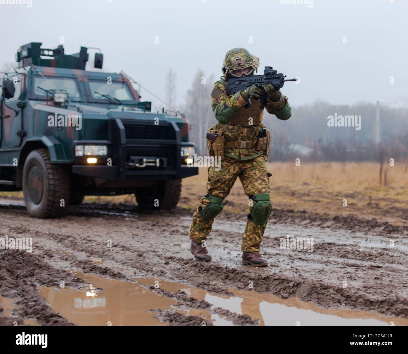 modern ukraine soldier patrolling with a machine gun in his hands Stock ...