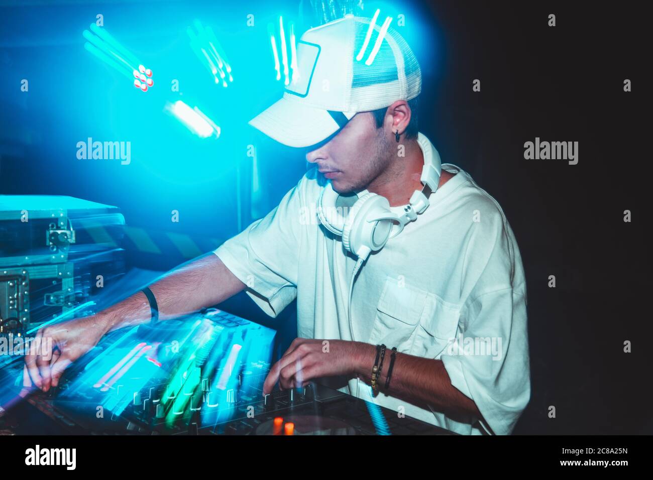 Dj mixes the track in the at party Stock Photo Alamy