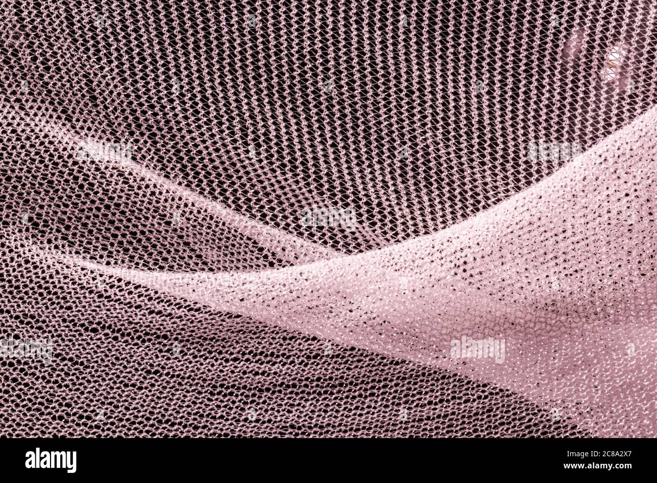 Macro photo of pink finely woven mesh Stock Photo - Alamy