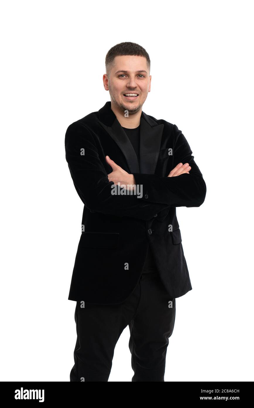 Portrait of happy businessman with arms crossed isolated over white ...