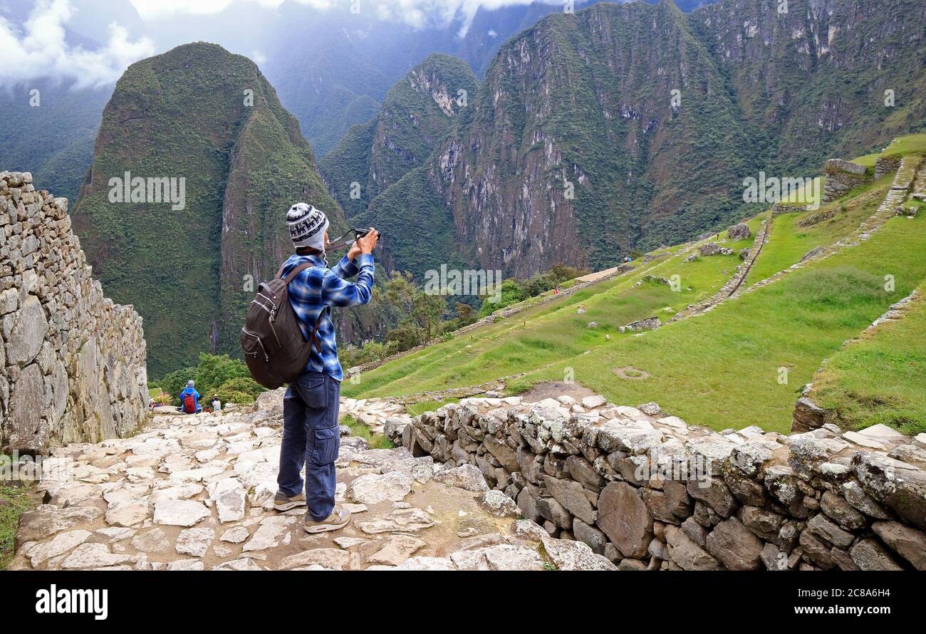 Machu picchu person steps hi-res stock photography and images - Alamy