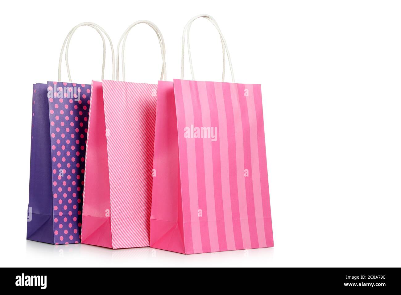 three paper shopping bags isolated on white Stock Photo