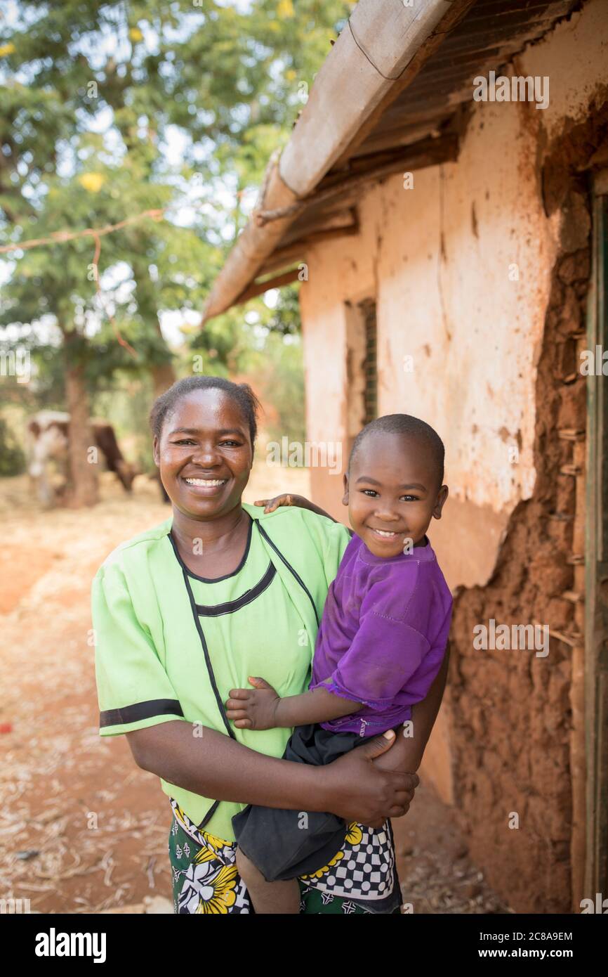 Christine Kiswyi (35), shown here with her son Victor (3), is participant in LWR's Isaiah 58 project. LWR Isaiah 58 Project -  Makueni County, Kenya. Stock Photo