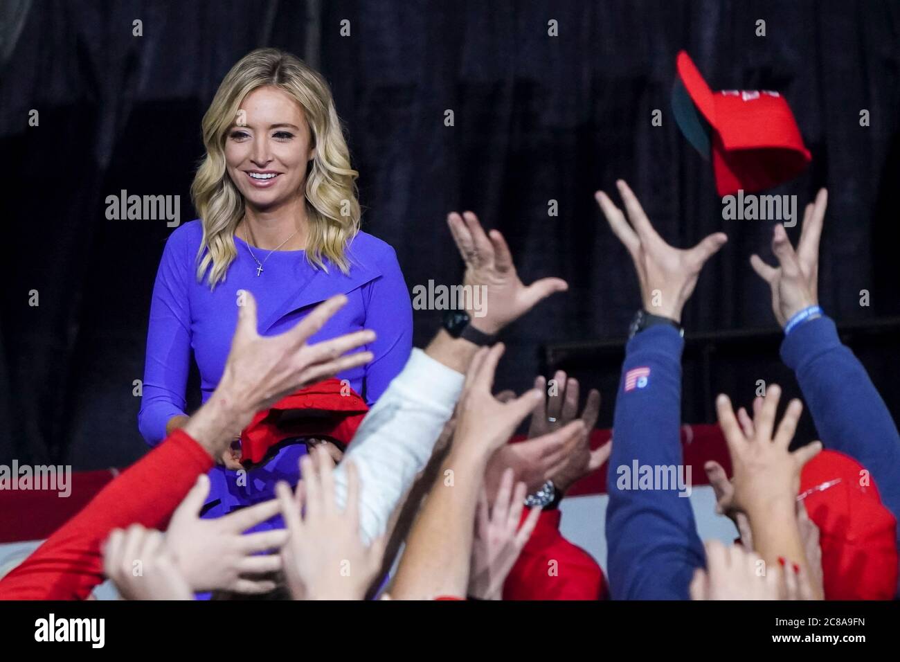 White House Press Secretary Kayleigh McEnany throws MAGA hats to the audience at the Keep America Great Rally in the North Charleston Coliseum February 28 2020 in North Charleston, South Carolina. Stock Photo