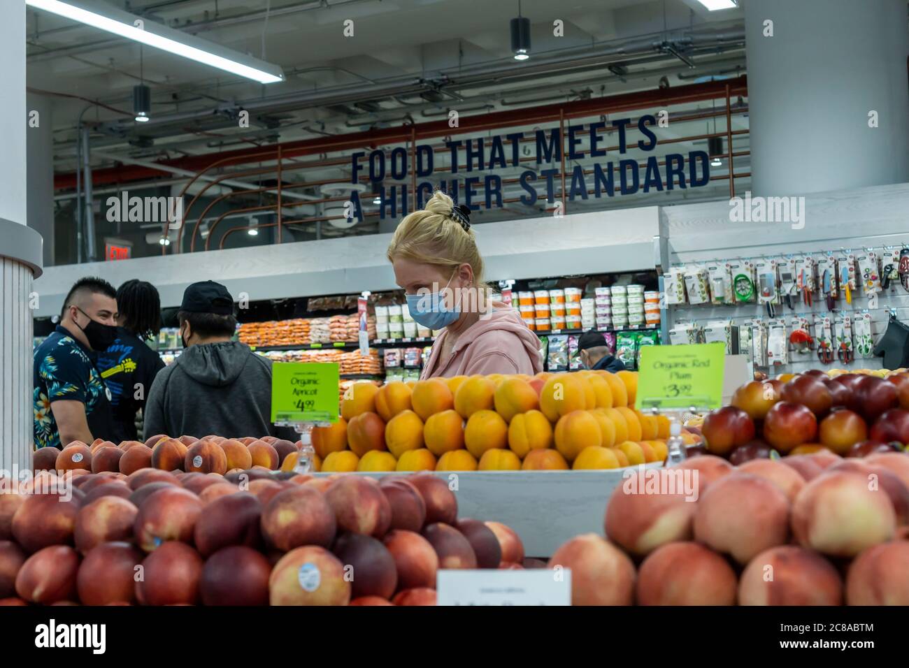 Shoppers in the produce department in the new Whole Foods Manhattan West in the Hudson Yards neighborhood of New York on opening day, Friday, July 17, 2020. (© Richard B. Levine) Stock Photo