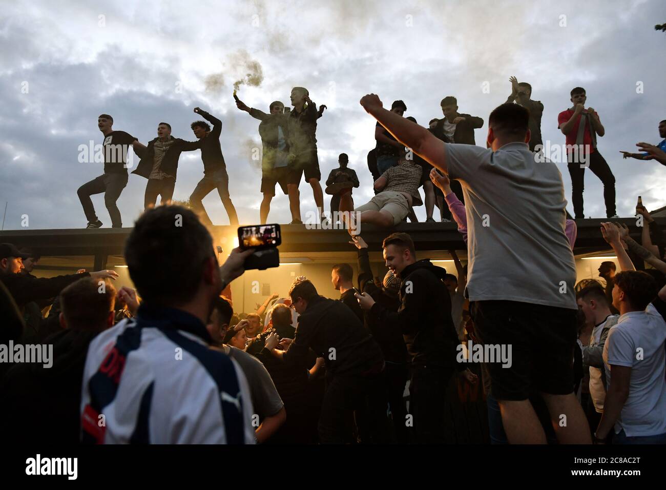 West Bromwich Albion fans celebrate their side being promoted to the Premier League. Stock Photo