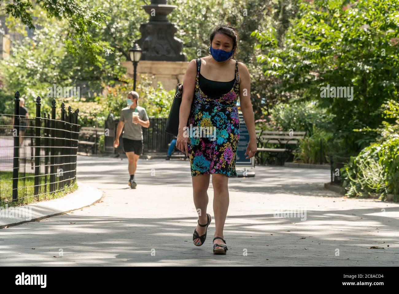 New Yorkers and visitors in Madison Square Park in New York on Monday, July 20, 2020. The city is suffering through mid-90s temperatures with Monday’s expected “real-feel” temperature passing 100 degrees. . (© Richard B. Levine) Stock Photo