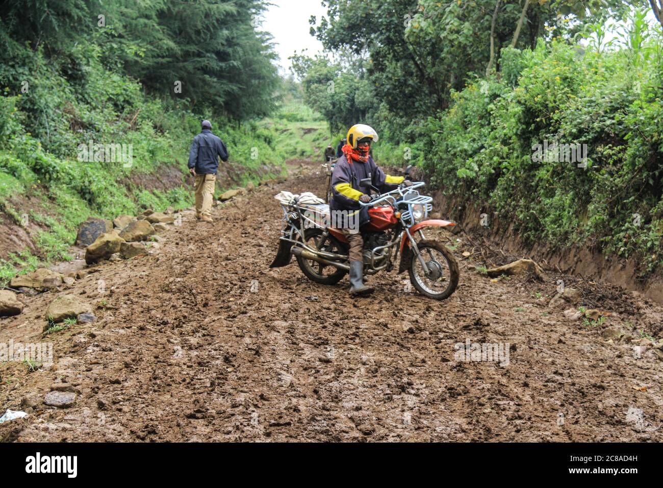 A Resident Of Marioshoni Struggles To Riding His Motorbike In A Muddy Road The Government Of Kenya Is Forcefully Evicting People Who Allegedly Settled On Gazetted Forest Land To Pave Way For Reforestation
