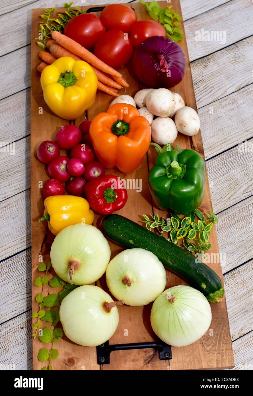 Fresh organic farmer's market vegetables washed and ready to cook into healthy lifestyle family meals Stock Photo