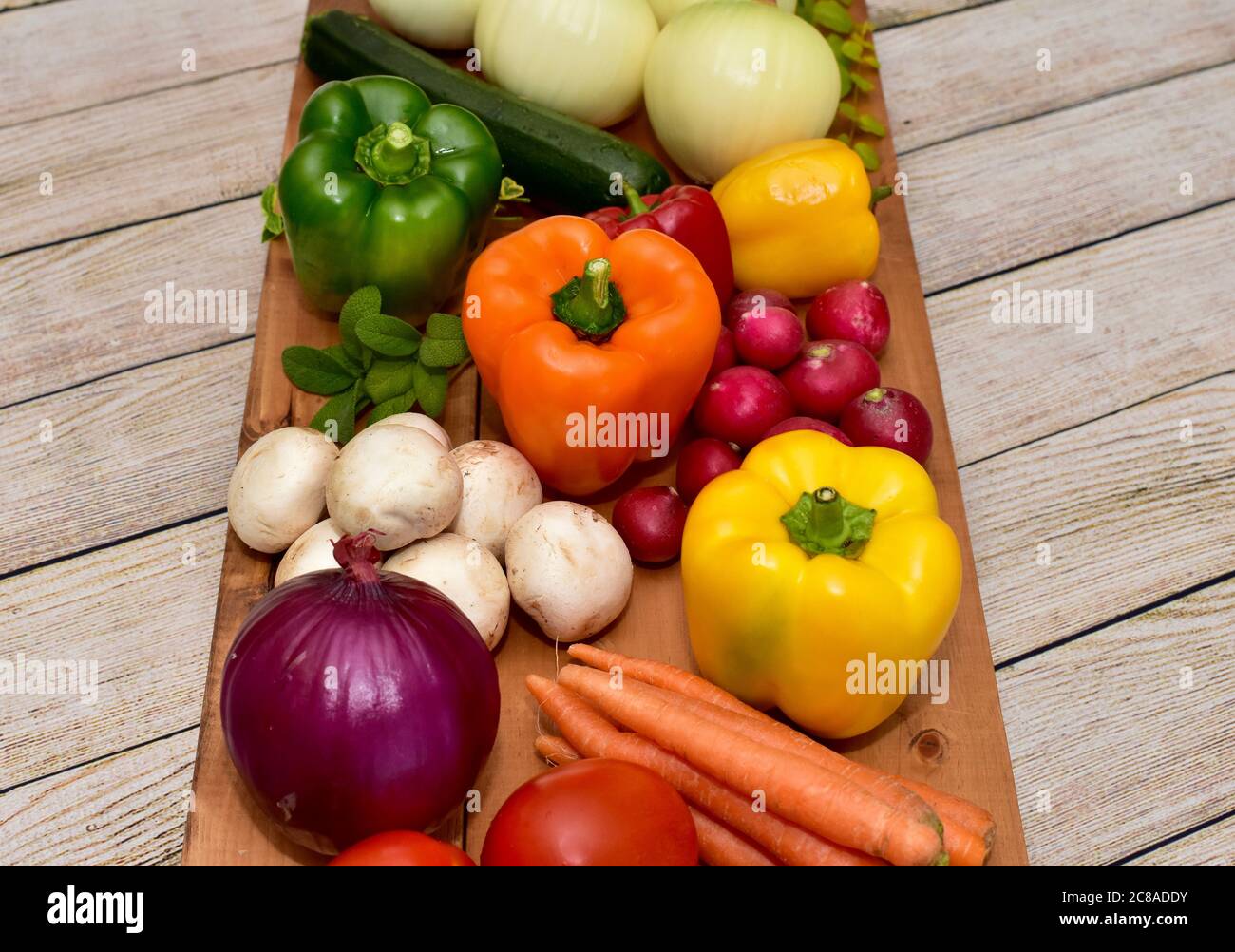 Fresh organic farmer's market vegetables washed and ready to cook into healthy lifestyle family meals Stock Photo