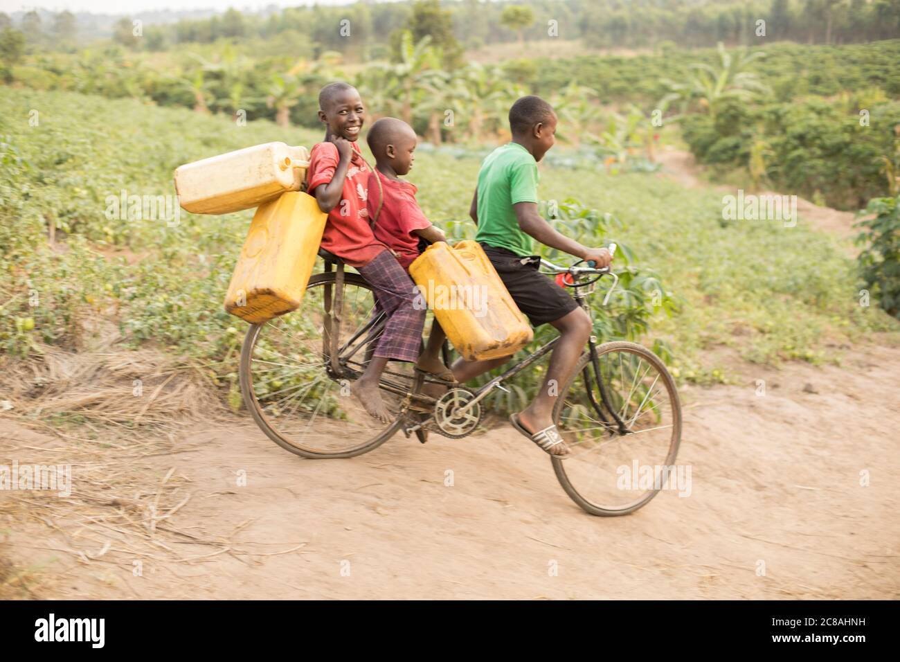 Child carry water africa hires stock photography and images Alamy