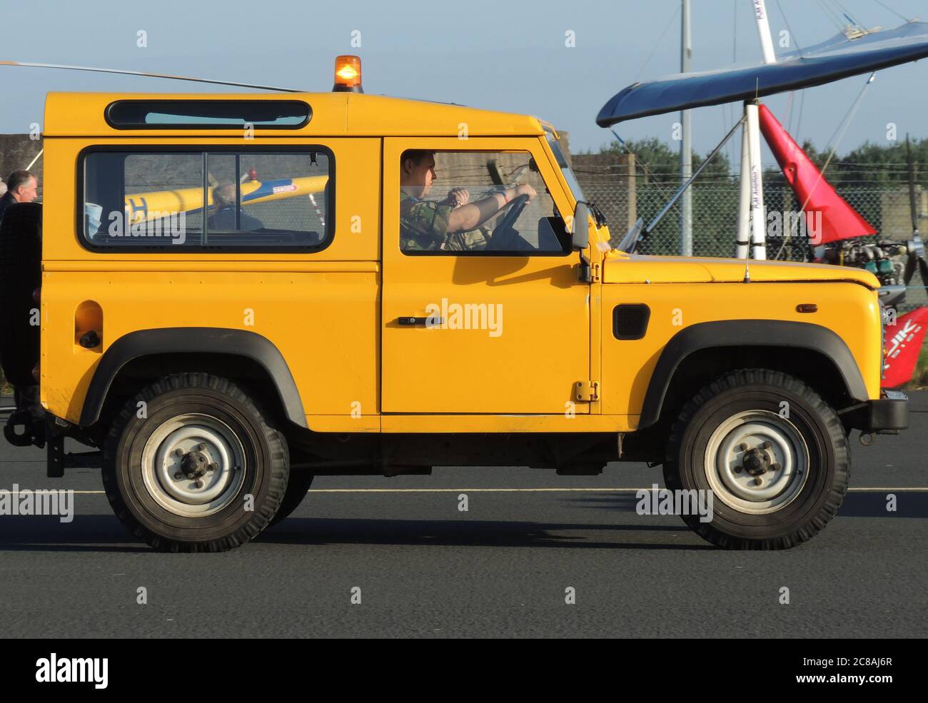 A Land Rover Defender operated by the Royal Air Force in the Flight Safety role, at RAF Leuchars during the 2012 air show. Stock Photo