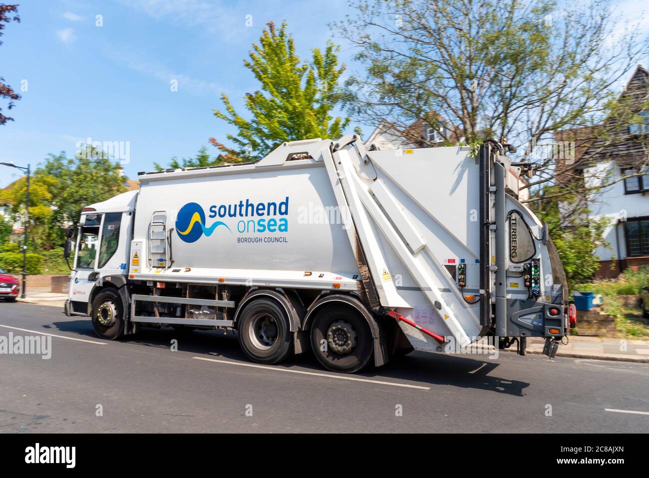 Southend on Sea Borough Council refuse truck in Westcliff on Sea, Southend, Essex, UK. Veolia Environmental Services. Bin lorry driving in street Stock Photo
