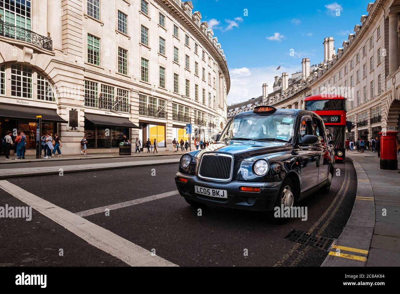 Typical London black cab at Regent Street, a famous landmark of the