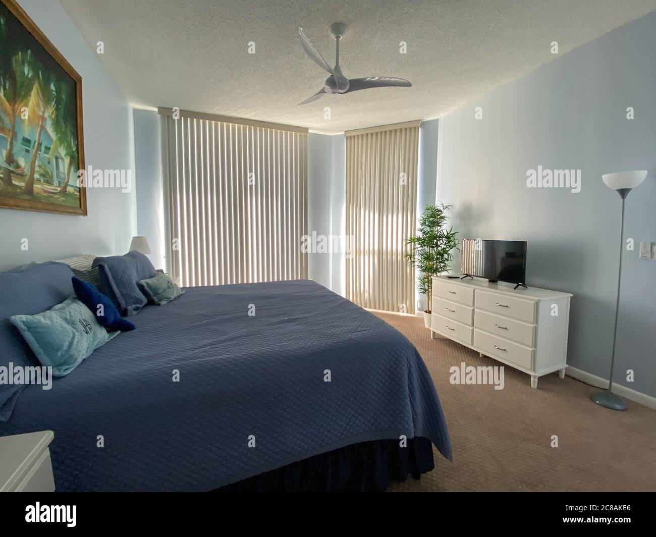 An interior view of a master bedroom room in a beach condominium in