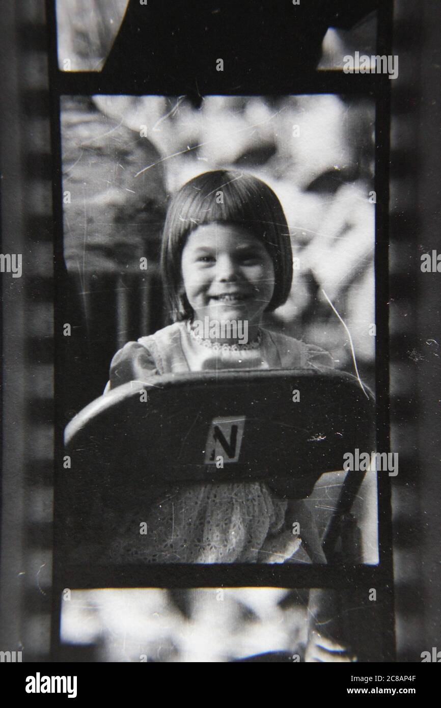 Fine 70s vintage contact print black and white photography of a young