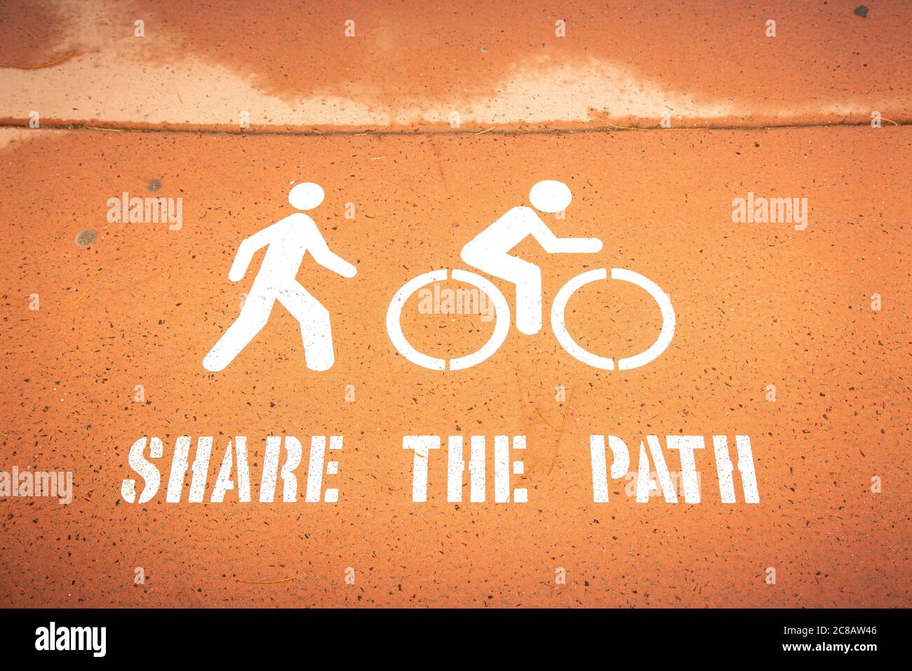 Share the path signage on footpath. Stock Photo