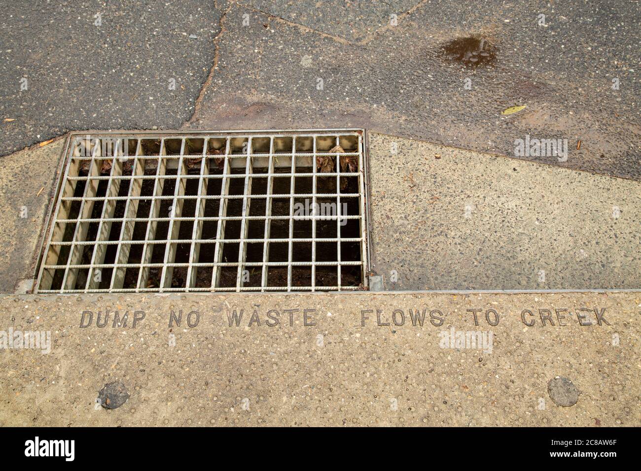 Stormwater drain and gutter. Stock Photo