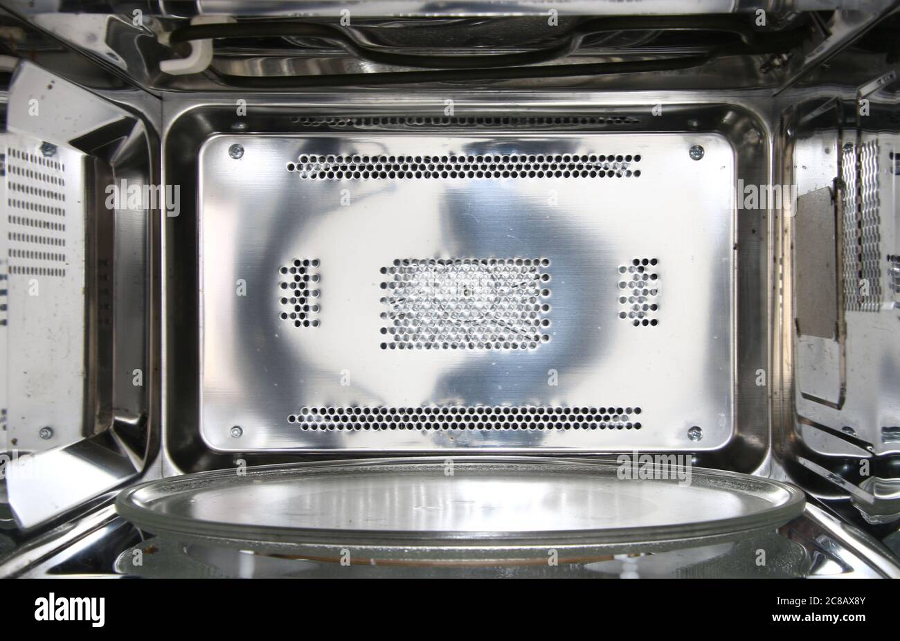 front  view inside of empty clean microwave oven interior Stock Photo