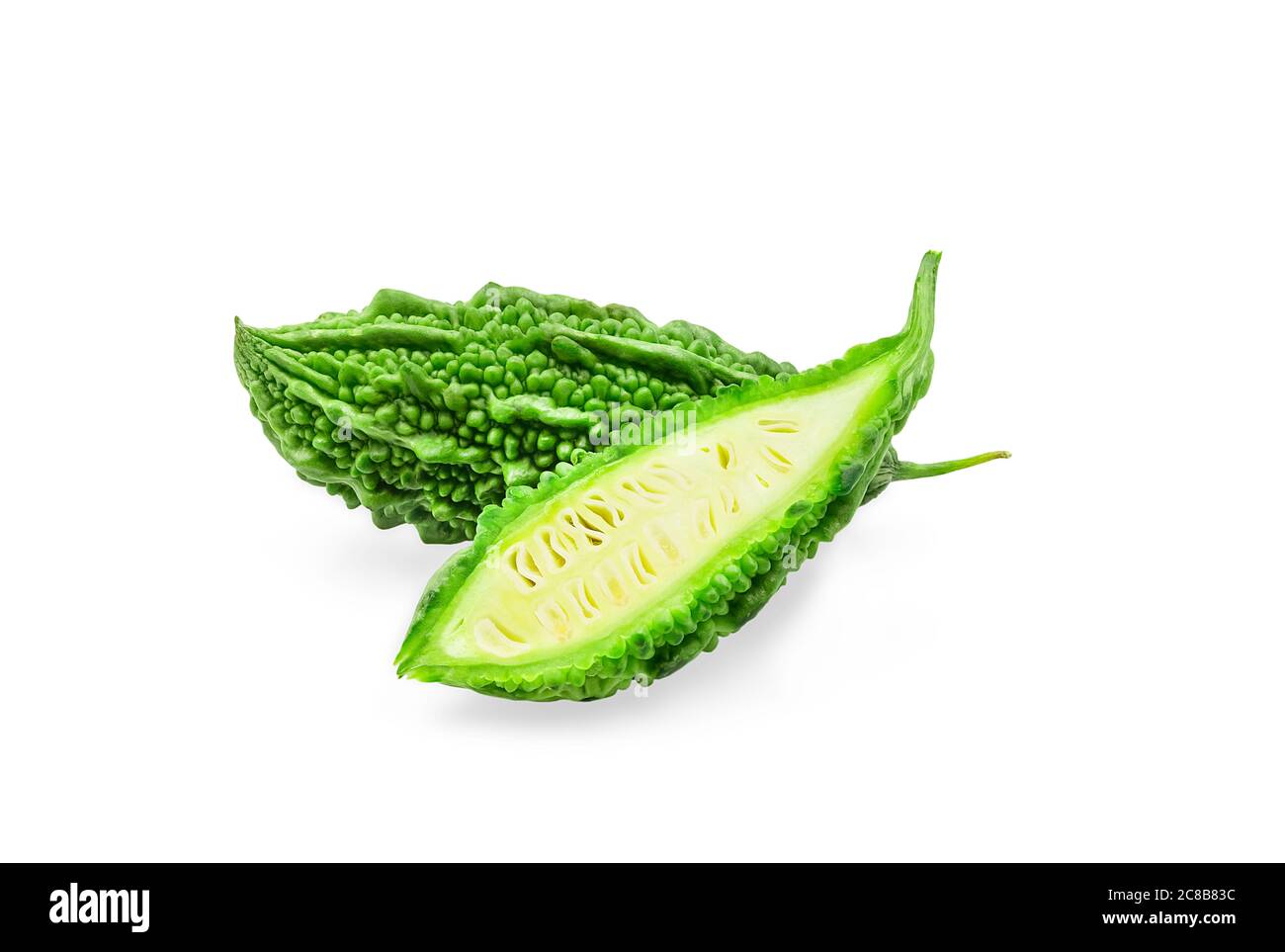 Organic green bitter gourd on white isolated background with clipping path. Raw bitter gourd or