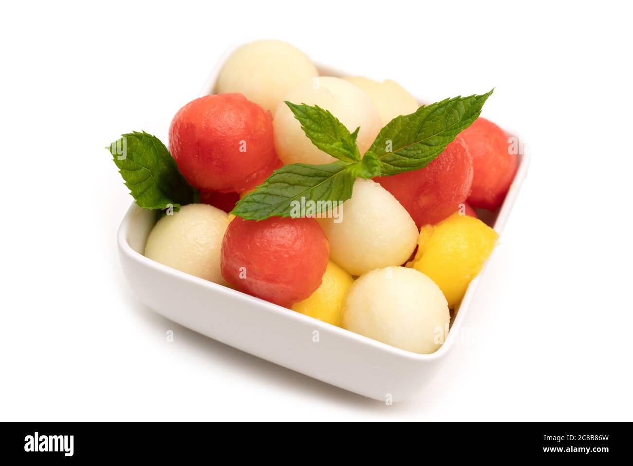 Fruit salad in a white bowl Stock Photo