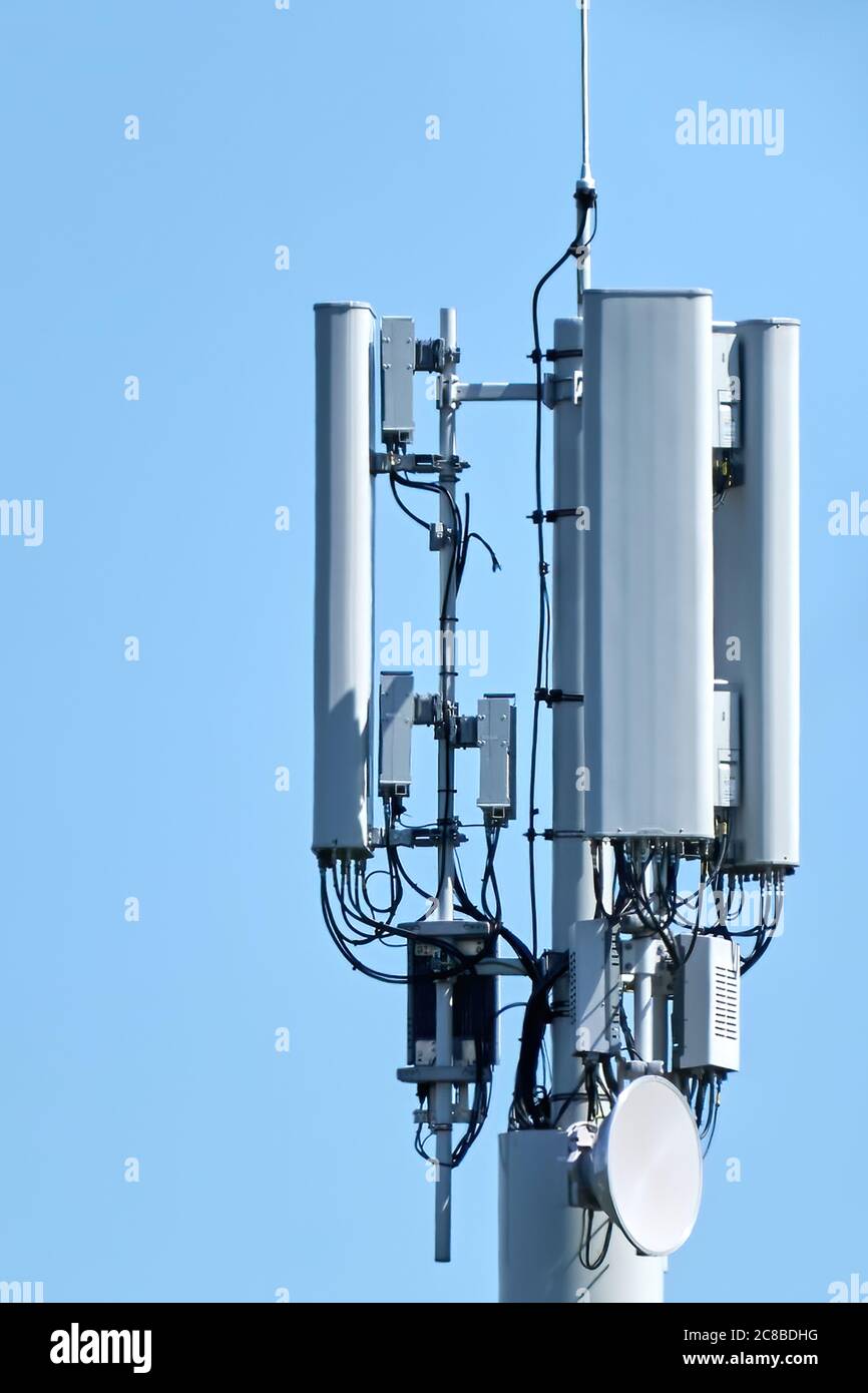 5G Network Connection Concept-5G smart cellular network antenna base station on the telecommunication mast Stock Photo