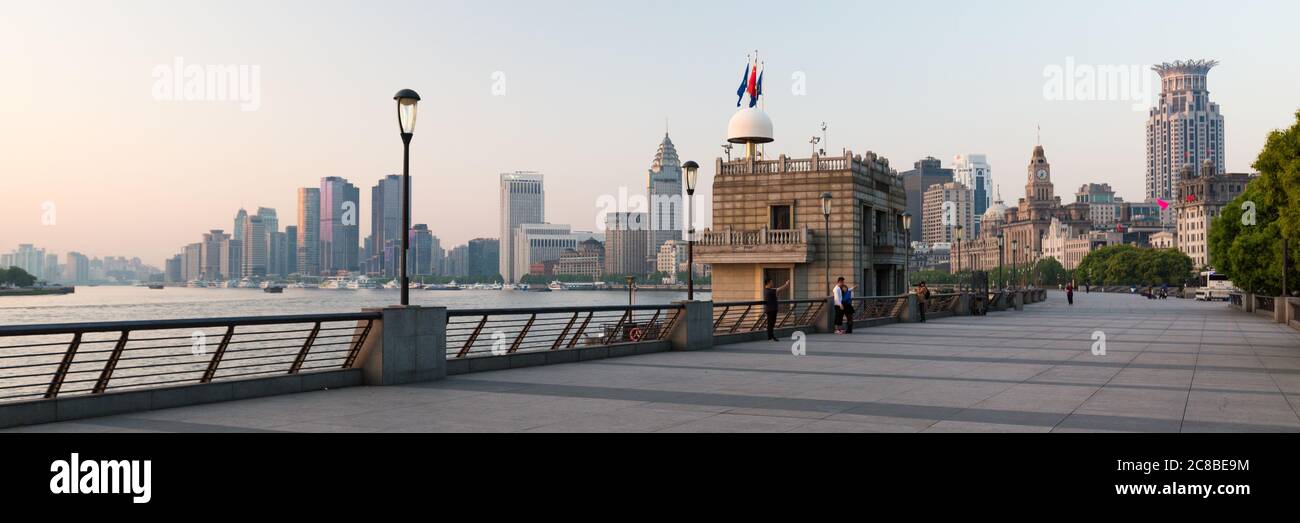 Shanghai, China - April 17, 2018: View along The Bund - promenade with a mixture of historical and modern buildings. Stock Photo