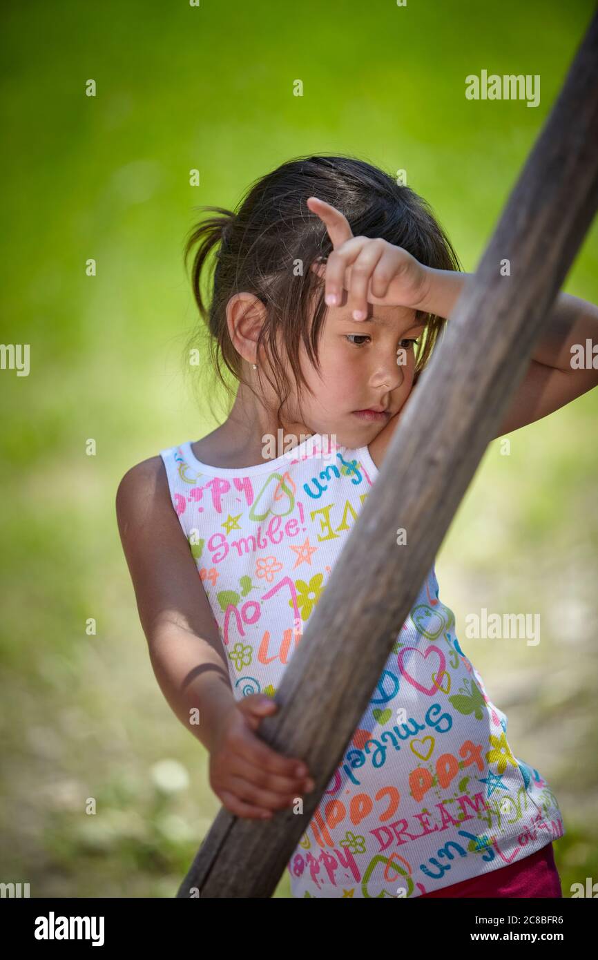 Portrait of young girl outdoors Stock Photo