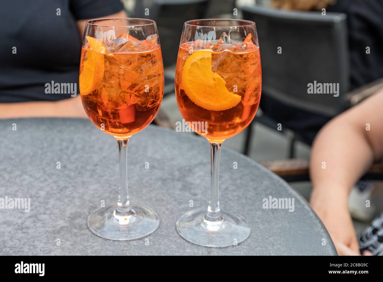 Two glasses of Aperol Spritz on a table Stock Photo