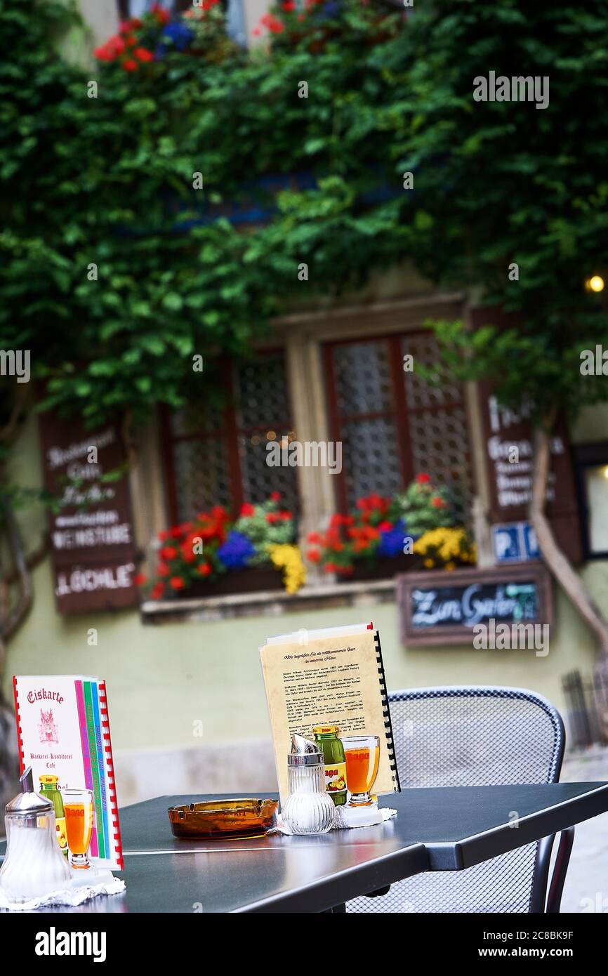 Outdoor cafeteria on the streets of Rothenburg ob der Tauber, Germany Stock Photo