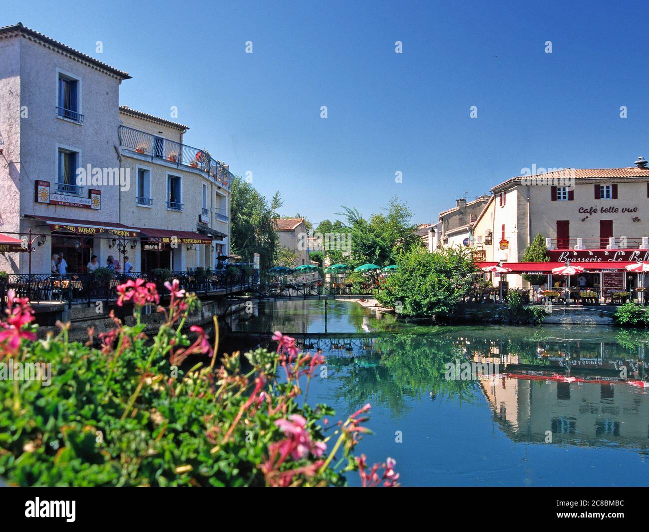 l-isles-sur-la-sorgues-typical-village-with-its-paddle-wheels-stock
