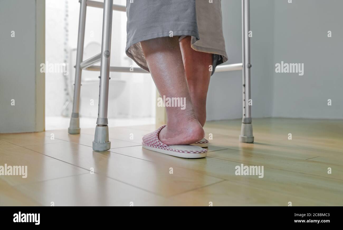 Elderly swollen feet or edema leg walk into bathroom Stock Photo Alamy