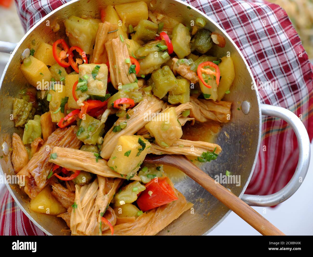 Vietnamese vegan food for vegetarian, woman hand hold pan tofu skin