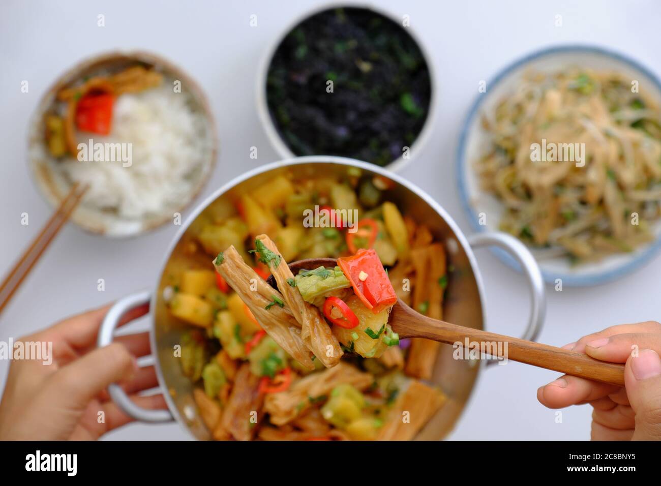 Vietnamese vegan food for vegetarian, woman hand hold pan tofu skin