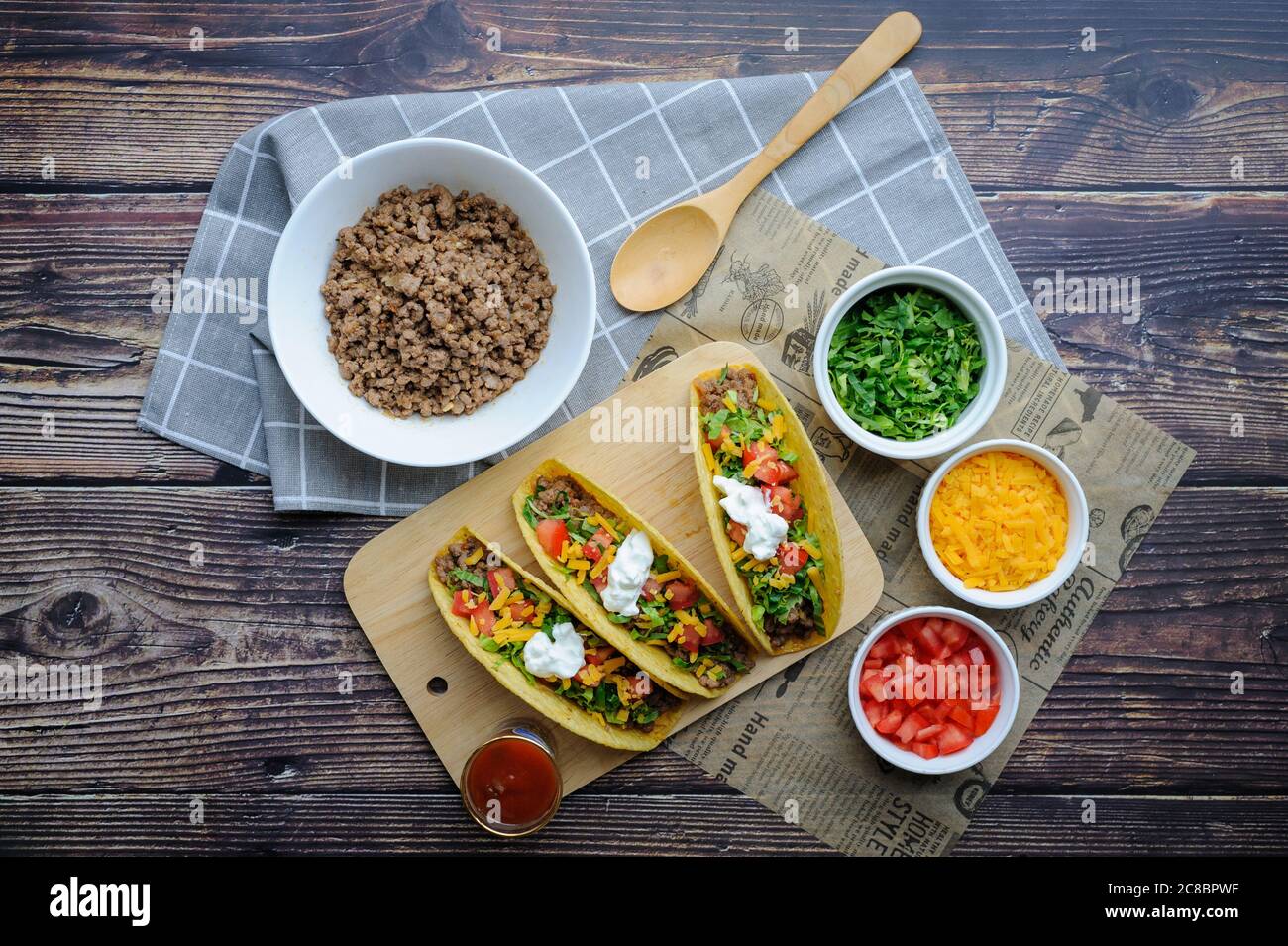 Hard shell Beef Taco with ingredients. Maxican tacos with grounded beef