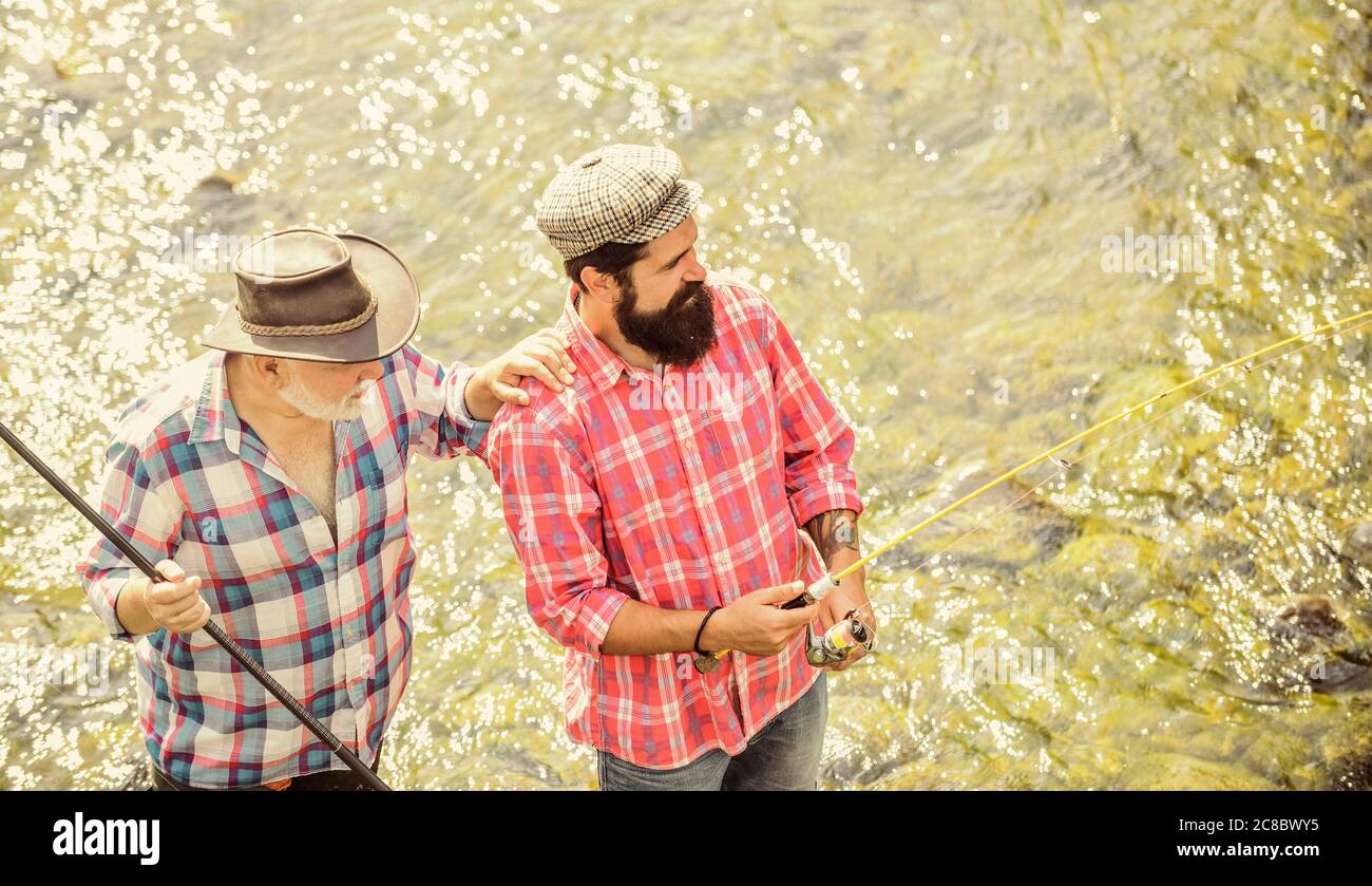 lifestyle concept. Big game fishing. friendship. father and son fishing. Poaching. rural getaway