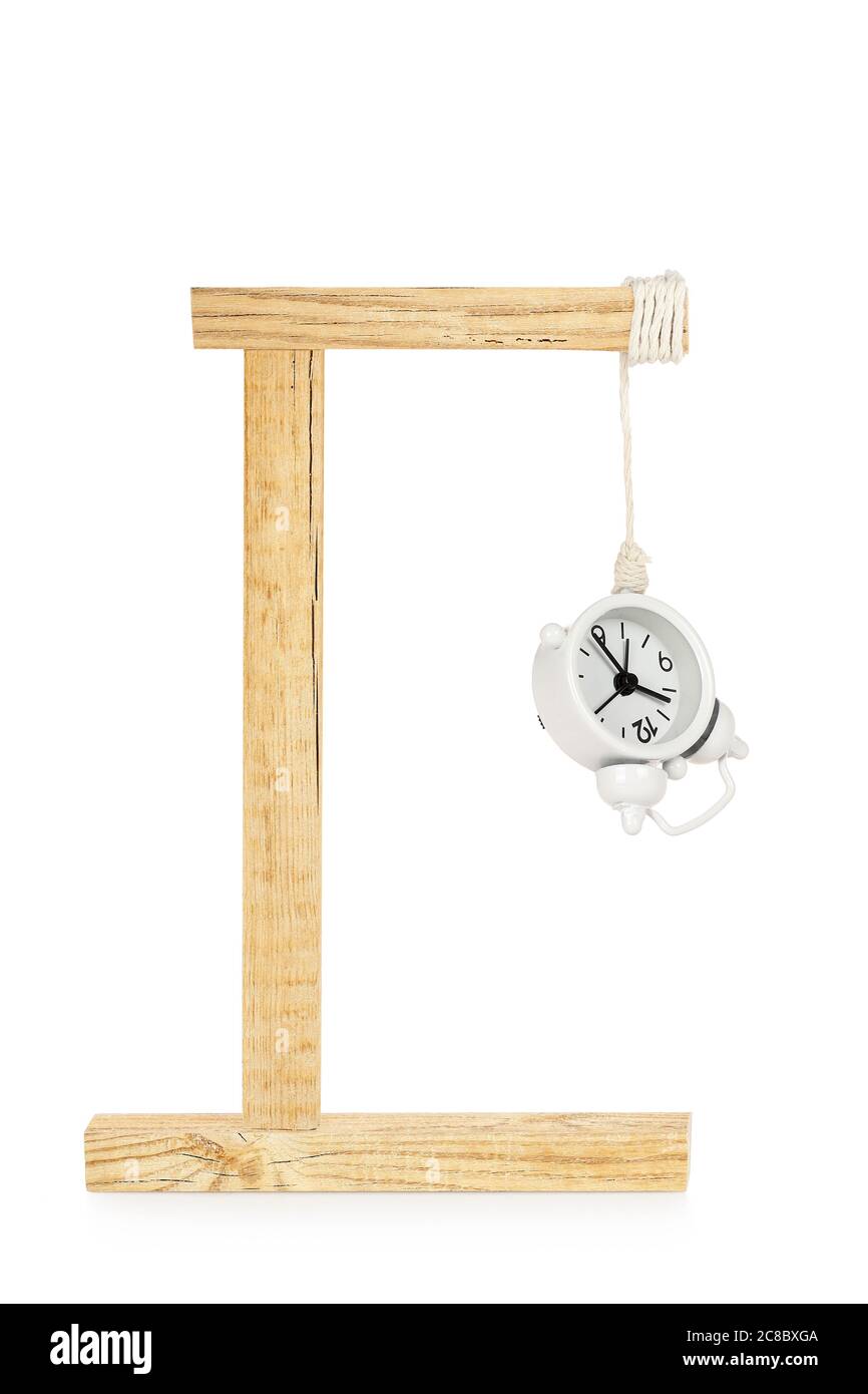 alarm clock hanging on gallows, abstract time concept Stock Photo