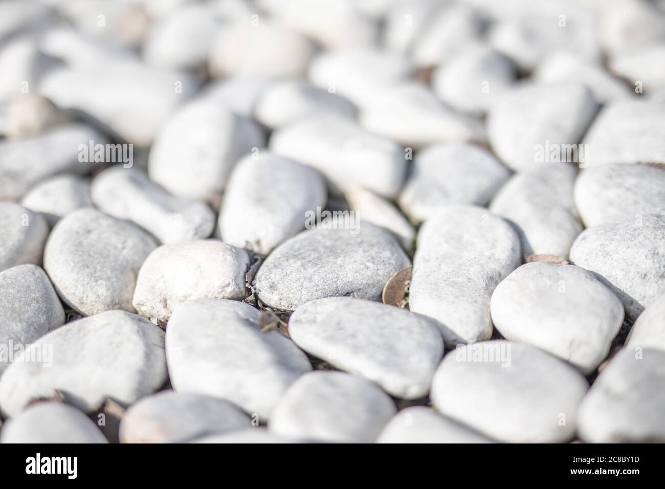 White stone background. White pebbles stone for background. Stock Photo