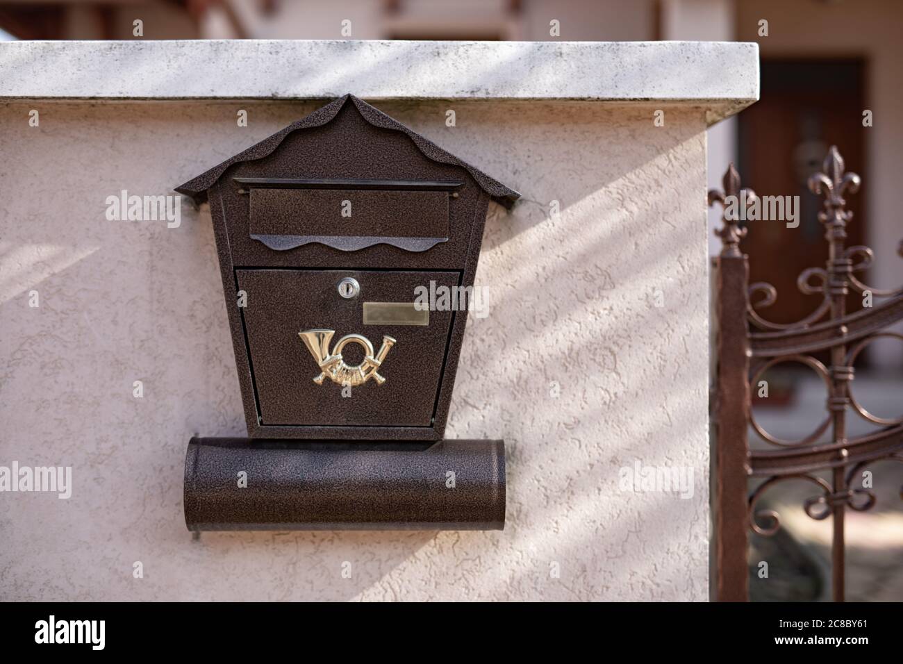 Brown mailbox on brick wall, vintage mailbox style Stock Photo Alamy