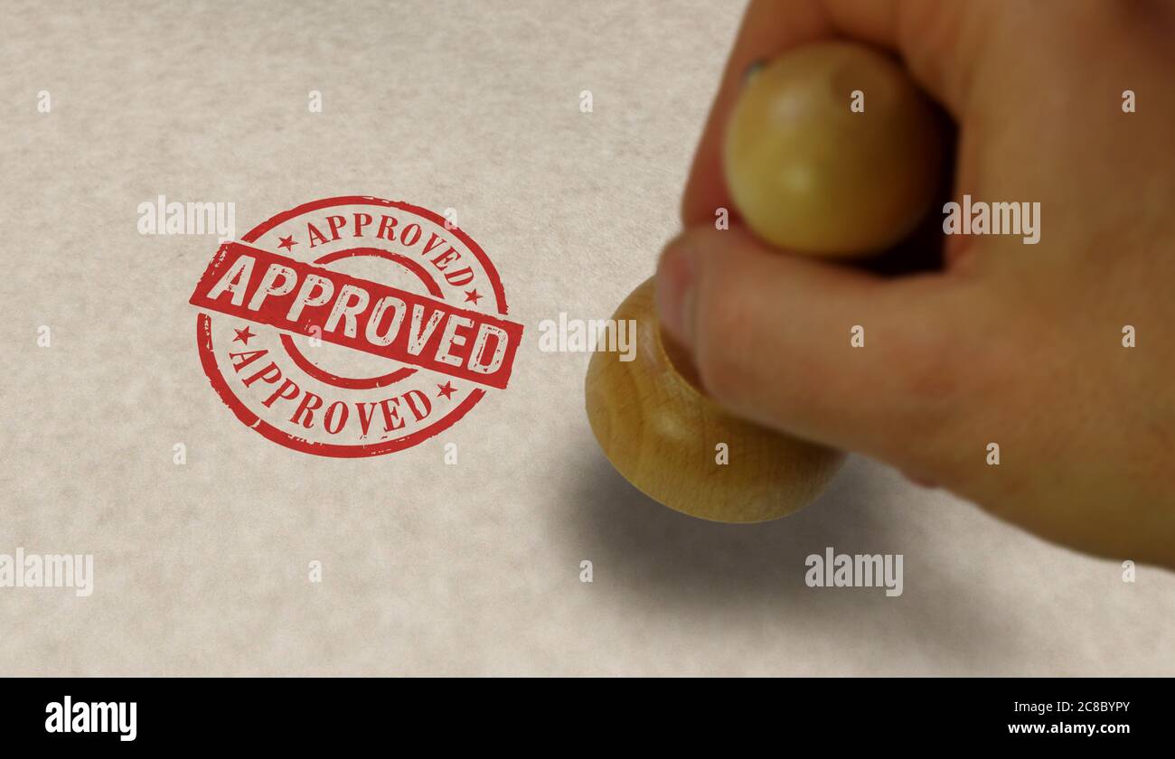 Approved stamp and stamping hand. Found, accepted, admitted and success concept. Stock Photo