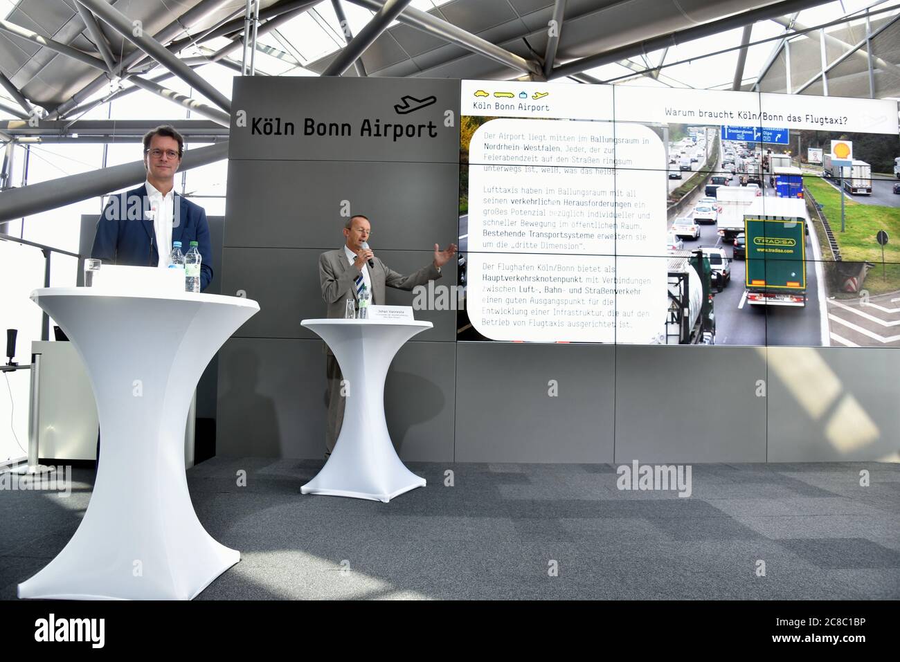 22 July 2020, North Rhine-Westphalia, Cologne: Hendrik Wüst (l-r), Minister of Transport of the State of North Rhine-Westphalia, and Johan Vanneste, Managing Director of Flughafen Köln/Bonn GmbH, will be present at the presentation of the feasibility study on the subject of Flight Taxis at Cologne Bonn Airport - Perspectives of a new technology. Photo: Horst Galuschka/dpa Stock Photo