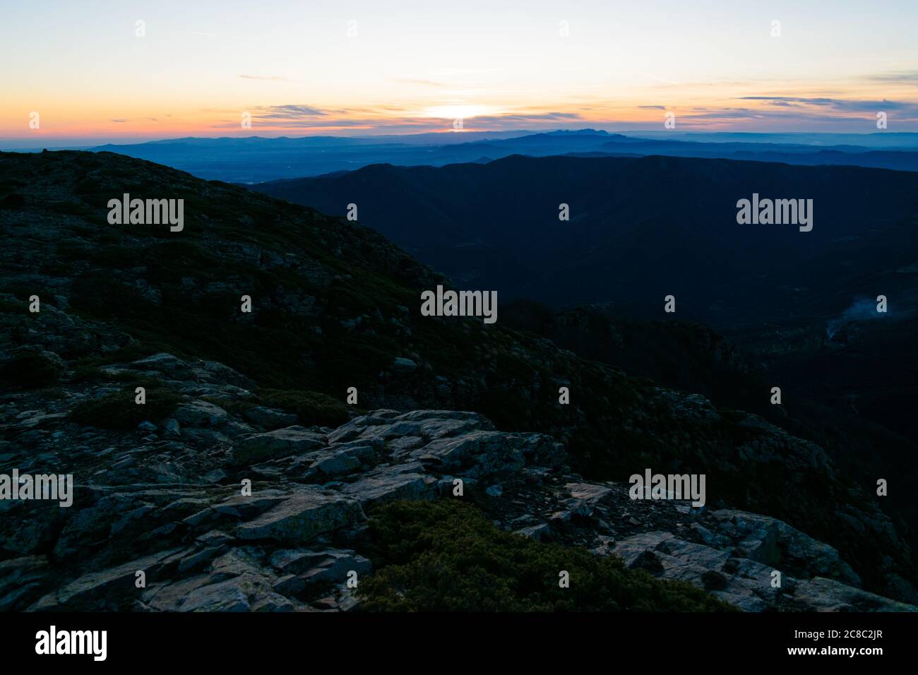 Nice sunset in the mountains Stock Photo - Alamy