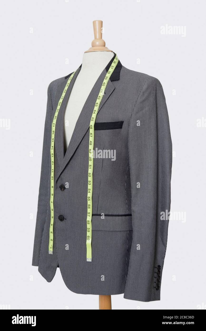 Semiready Jacket With Tailors Measuring Tape On Mannequin Against