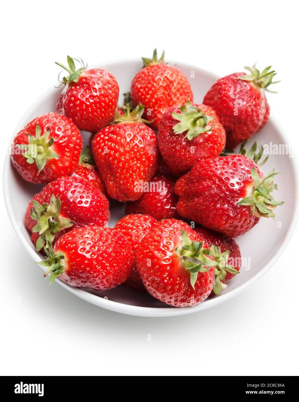 Fresh strawberries in bowl Stock Photo