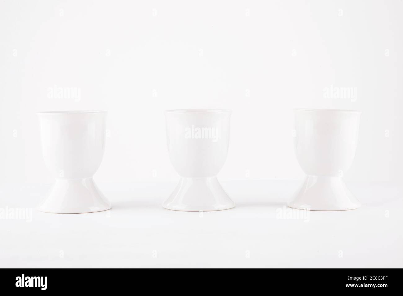 Three Egg Cups Stock Photo Alamy