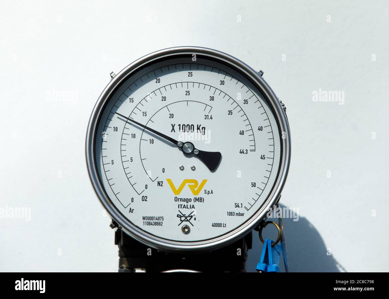 Closeup of pressure gauge on nitrogen gas tank . Multiple scales for