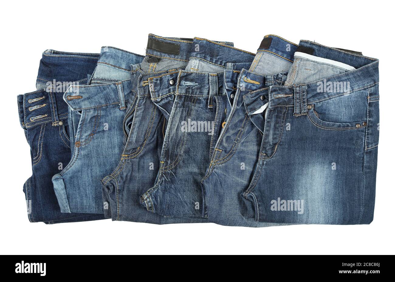 pairs of blue jeans on white Stock Photo