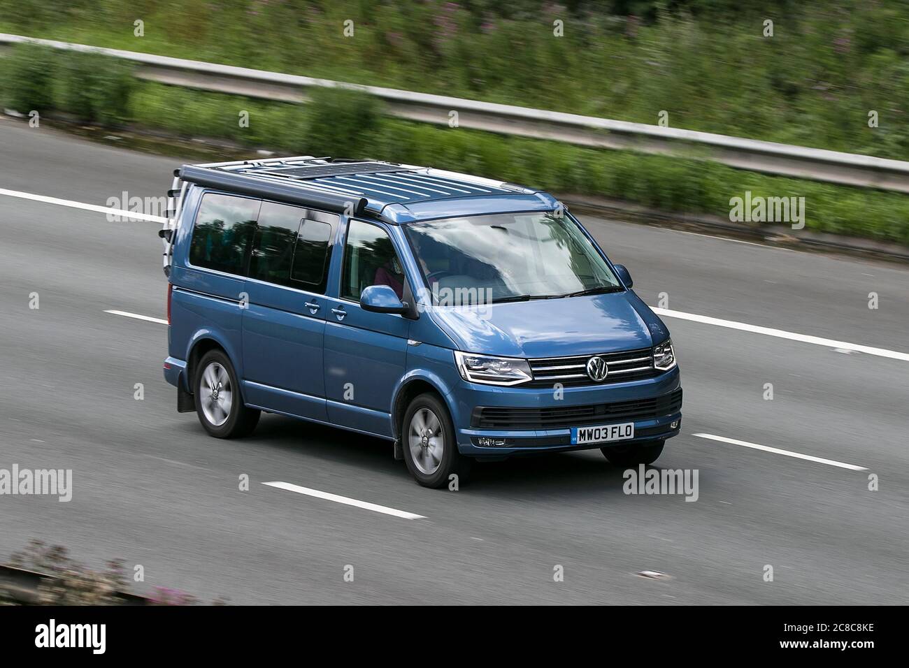 A 2017 Volkswagen VW California Ocean Tdi Blue Car Large MPV Diesel driving  on the M6 motorway near Preston in Lancashire, UK Stock Photo - Alamy