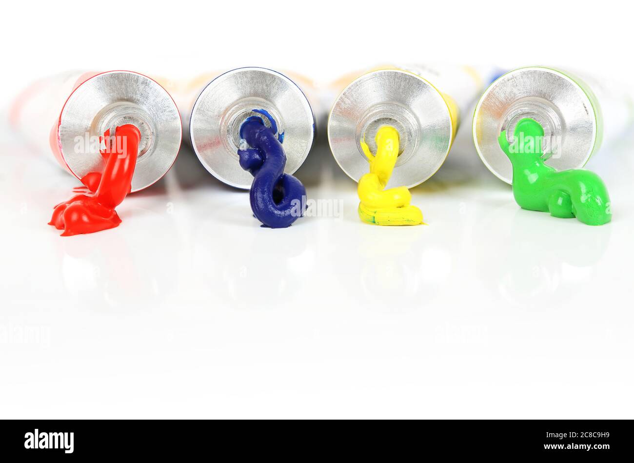 acrylic paints with paint coming out of them Stock Photo Alamy