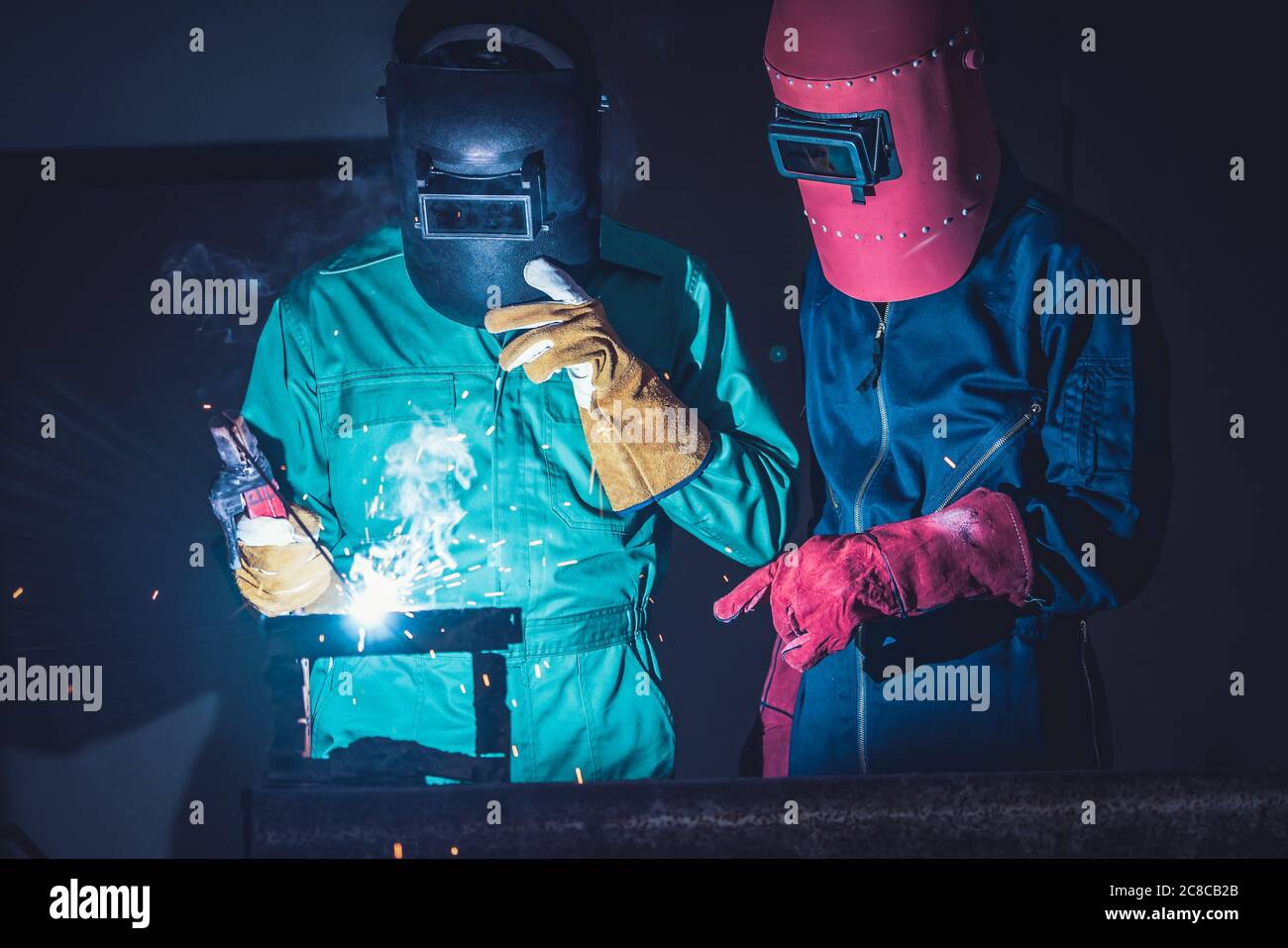 Metal welding steel works using electric arc welding machine Stock